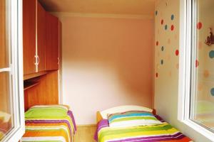 Ein Bett oder Betten in einem Zimmer der Unterkunft Apartments with parking spaces Brgujac, Vis - 8919