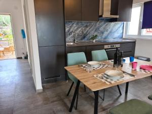 Kuchyň nebo kuchyňský kout v ubytování Apartments by the sea Korcula - 9158