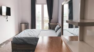 Katil atau katil-katil dalam bilik di Lyly's House - Homestay