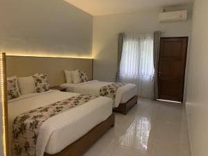Voodi või voodid majutusasutuse Leebong Island Resort toas