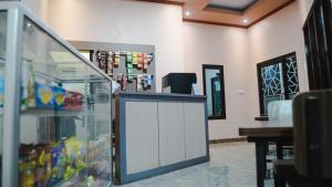 Кухня или мини-кухня в Sitiinggil Guest House Syariah
