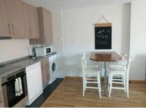 Kuchyň nebo kuchyňský kout v ubytování Apartamento La Montañesa en Aínsa, bonito apartamento con grande terraza