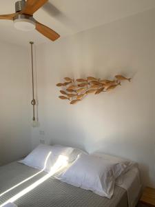 Postel nebo postele na pokoji v ubytování Paros-Memories-Neubau-Villen, Sportpool
