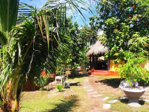 Zahrada ubytování Kampung Meno Bungalows