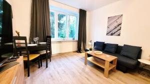 Televízia a/alebo spoločenská miestnosť v ubytovaní Great Life - apartment next to metro station