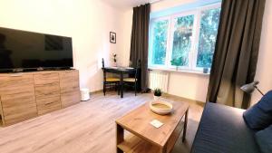 Televízia a/alebo spoločenská miestnosť v ubytovaní Great Life - apartment next to metro station