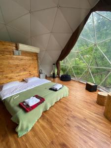 Voodi või voodid majutusasutuse Elsesi Racha Glamping toas
