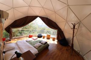 Voodi või voodid majutusasutuse Elsesi Racha Glamping toas
