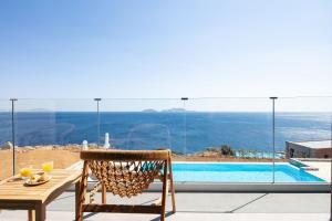 The swimming pool at or close to Seafront elegant villas, with infinity pools & devine views!