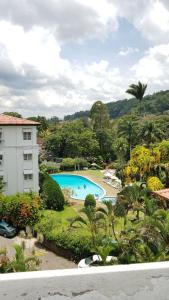 a view of a swimming pool from a building at Anna Asia Villa in Kandy