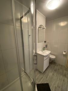 Kúpeľňa v ubytovaní Coser Apartamenty Metro ONZ + 8 fotografií