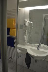 Koupelna v ubytování Hotel Aquamarin