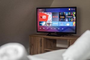 TV a/nebo společenská místnost v ubytování Pansion A&M Vlašić