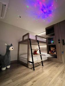 Letto o letti in una camera di Moose Hotel Nimman