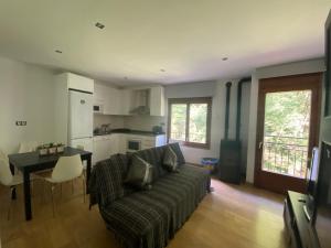 Kuchyň nebo kuchyňský kout v ubytování Precioso apartamento con vistas montaña o rio