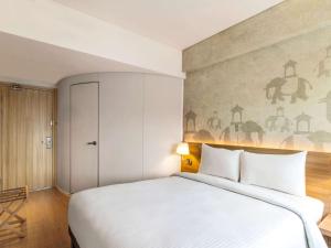 ibis Bengaluru Hebbal - An Accor Brand客房内的一张或多张床位