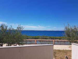 a view of the ocean from a house at Pension Augustino in Ražanac