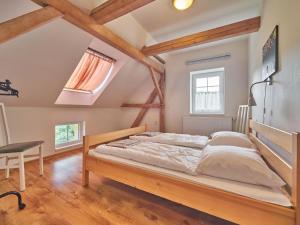 Katil atau katil-katil dalam bilik di Spacious holiday in Lampertice near ski area