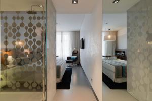 Cama o camas de una habitación en Inspira Liberdade Boutique Hotel