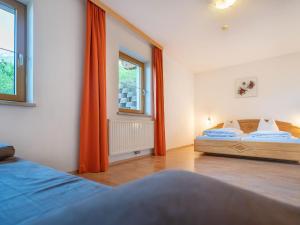 Ein Bett oder Betten in einem Zimmer der Unterkunft Apartment Neustift near Stubai Glacier Skiing