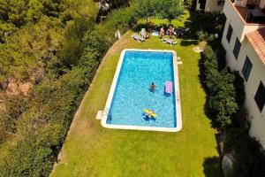 Bazén v ubytovaní Casa ASIA. Relax a 5 minutos de las calas TOP. alebo v jeho blízkosti