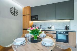 Kuchyňa alebo kuchynka v ubytovaní Apartament Widok