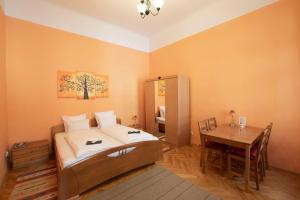 Posteľ alebo postele v izbe v ubytovaní Standard Apartment by Hi5 - Sofie's Suite