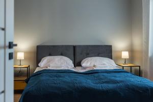 Posteľ alebo postele v izbe v ubytovaní Apartament Widok