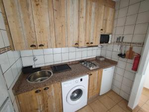 Kuchyňa alebo kuchynka v ubytovaní Formentera suite 14