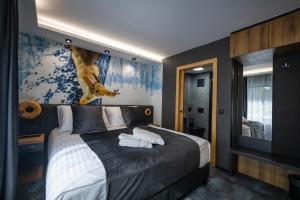 Posteľ alebo postele v izbe v ubytovaní 4 Évszak Erdeihotel**** - Mátrafüred