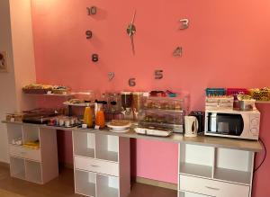 A kitchen or kitchenette at Color House Malpensa B&B
