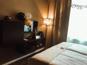 Posteľ alebo postele v izbe v ubytovaní Alfons Boutique Hotel