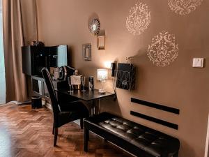 Posedenie v ubytovaní Alfons Boutique Hotel