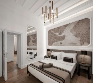 A bed or beds in a room at AKKA Lush Hotel Taksim