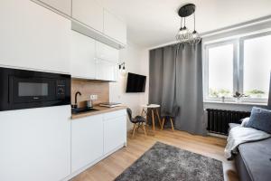 Kuchyňa alebo kuchynka v ubytovaní City Centre High Floor View Apartments