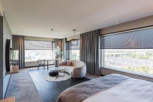 En eller flere senge i et værelse på Van der Valk Hotel Düsseldorf + 66 billeder