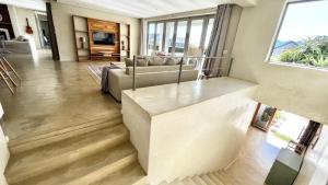 a living room with a couch and a table at No2 Merlot in Cape Town