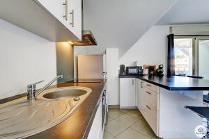 Photo de la galerie de l'établissement Amarena - 37m2 - Boucan Canot, à Saint-Gilles les Bains