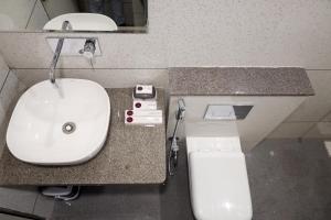 Koupelna v ubytování Tulsi Hotel
