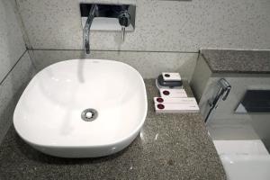 Koupelna v ubytování Tulsi Hotel