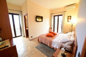 Posteľ alebo postele v izbe v ubytovaní B&B Dimora dell' Etna