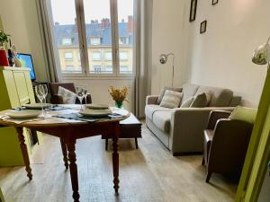 Posedenie v ubytovaní Appartement spacieux lumineux hypercentre