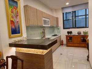 Kuchyň nebo kuchyňský kout v ubytování 707 Homestay