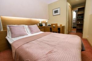 Postel nebo postele na pokoji v ubytování Bern Boutique by Rikas Hotels + 63 fotografií