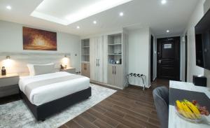 Katil atau katil-katil dalam bilik di Hotel Mokka City