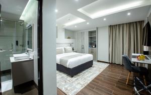 Katil atau katil-katil dalam bilik di Hotel Mokka City