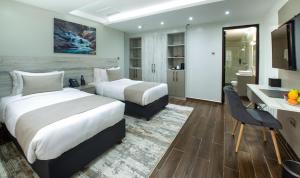 Katil atau katil-katil dalam bilik di Hotel Mokka City