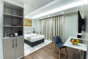 Katil atau katil-katil dalam bilik di Hotel Mokka City