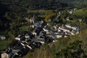 an aerial view of a small village in the hills at Studio meublé Viane in Viane