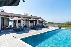 Bazén v ubytování Antesia Coral Bay Resort by Ezoria Villas - Adults only nebo v jeho okolí + 31 fotografií